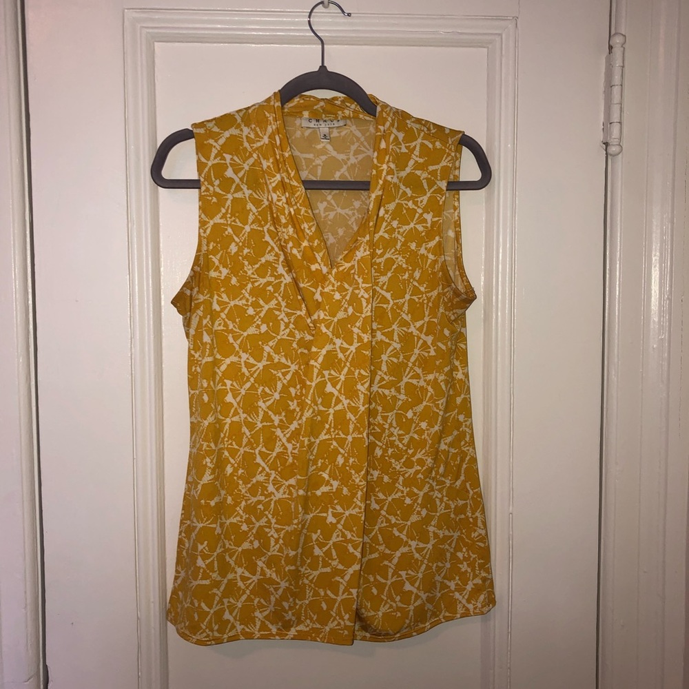 Yellow sleeveless blouse